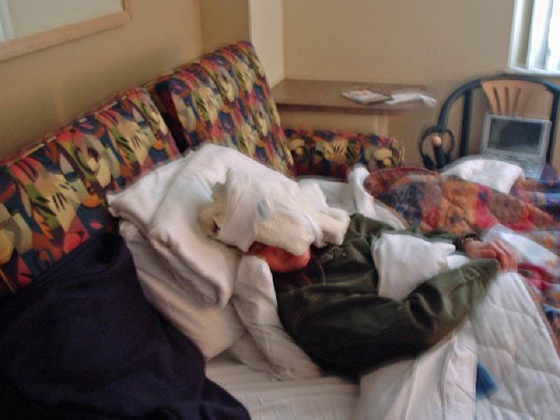 Marla rests and recovers with ice on her left eye after the surgery to release the stitches from the corner.