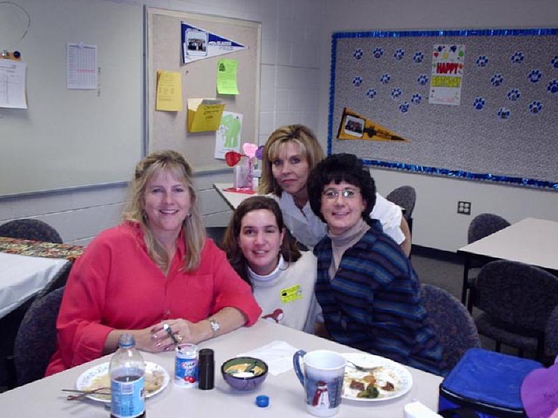 Marla and fellow teachers having lunch at Glacier Peak Elementary school. Marla is visiting once per week and visiting several classes, with students reading to her in reading groups.