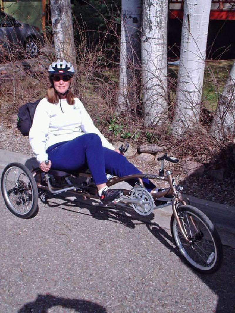 Marla is very excited to go for a ride on her new adaptive-recumbent bicycle. She's really enjoying the sense of freedom, independence, and outdoor adventure that the bicycle, donated by friends, offers to her!