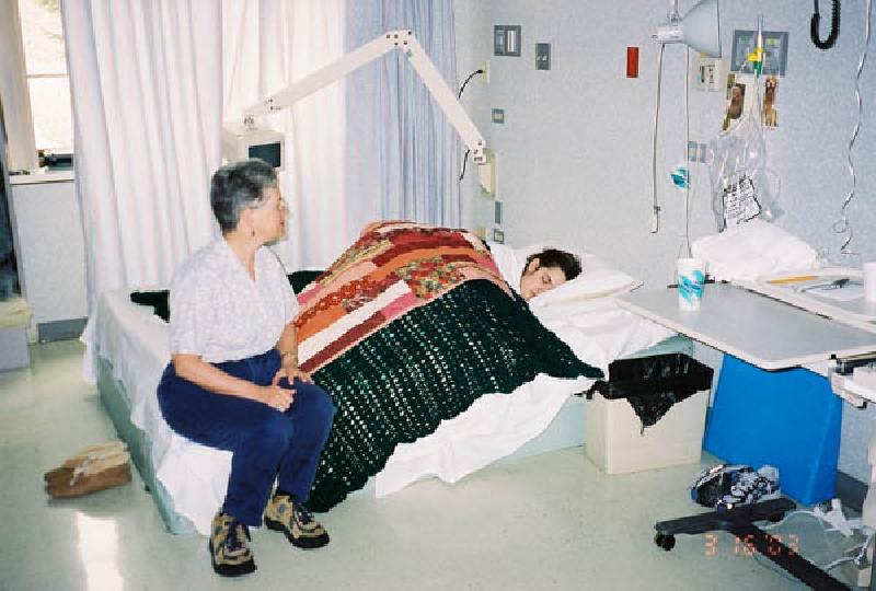 Marla has graduated from the Craig bed to a regular bed. She seems to be comfortably enjoying her snooze, snuggled up with a handmade Afghan from a friend, and a handmade quilt from her Aunt Anita.
