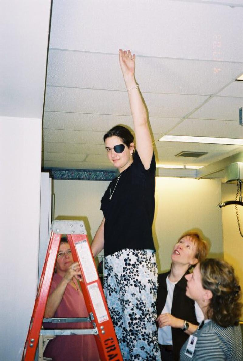 Marla has worked with Jean and Peggy several times on the ladder, to improve hand-eye and hand-foot coordination. You can see she's reached the top rung! After finishing, she looked at the ladder in disbelief, saying "How?!" But she did it!