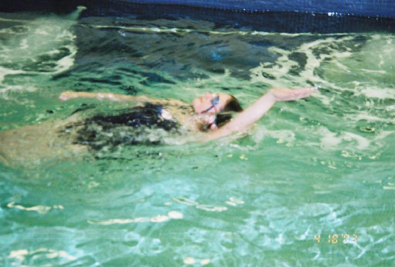 Marla shows off her excellent technique swimming backstroke.
