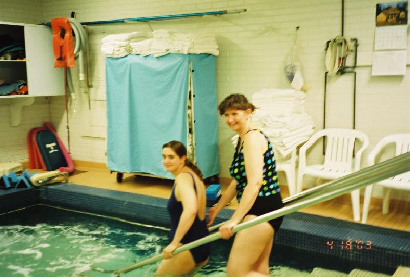 Marla entering the Craig therapy pool with Lisa, recreation therapist, for some swimming activity!