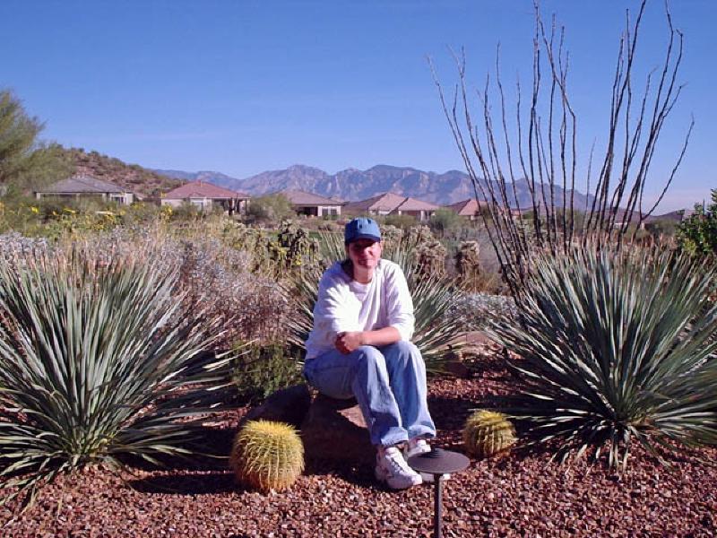 The Santa Catalina mountains form a panoramic backdrop to the desert plants in the backyard of the Tucson home of family friends Linda and Roger Cracraft, where Marla, Mary and Leo visited shortly after Christmas.