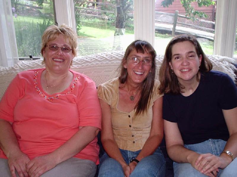 Visiting with cousins Kaye and Allison in Glenwood Springs. Notice the bend in Marla's right elbow!