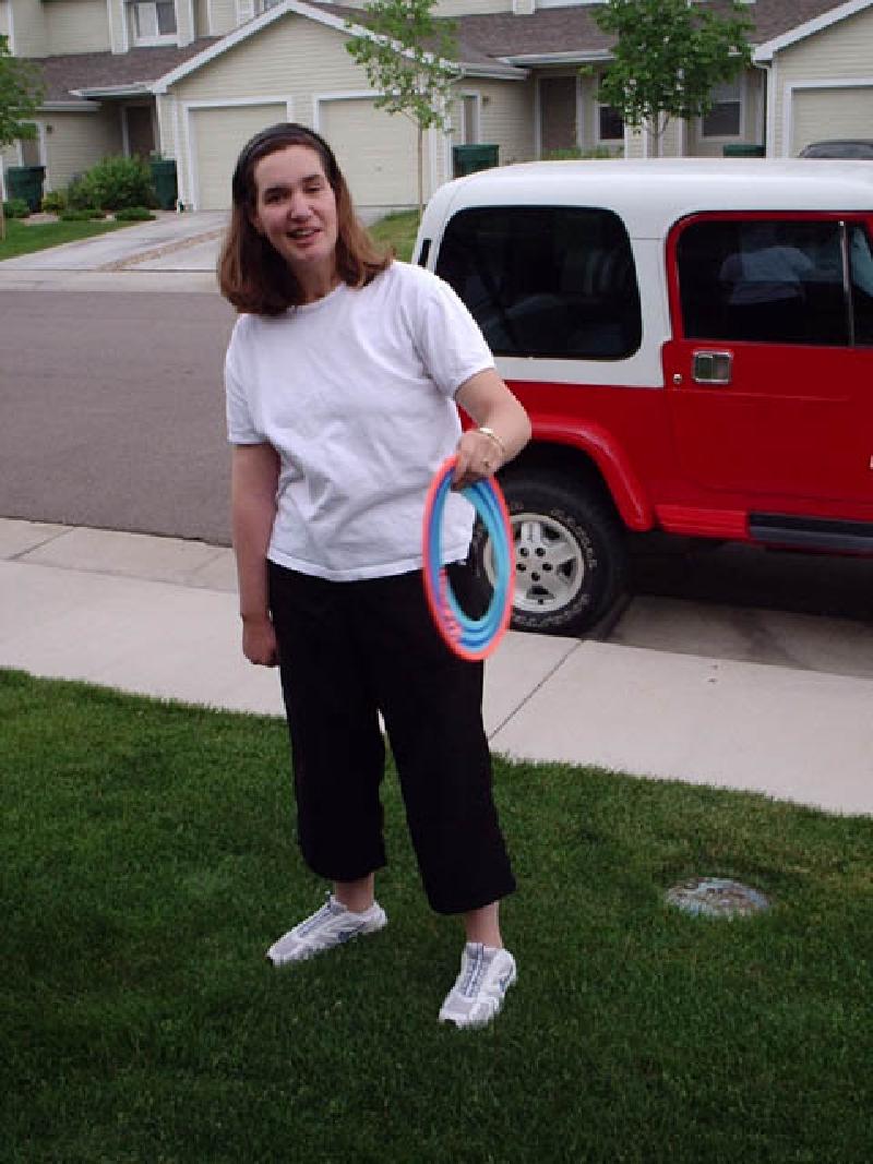 An impromptu game of frisbee out on the front lawn at the townhome in Northglenn.