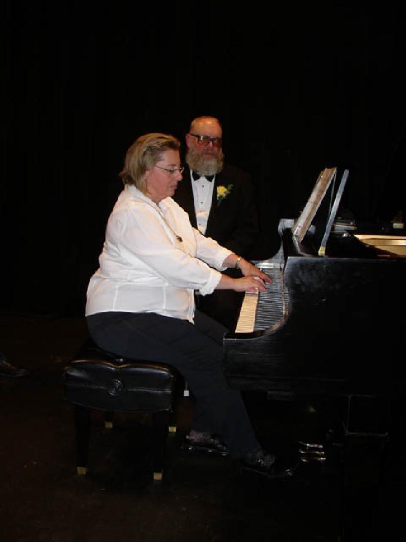 Roberta exhibits her perfect keyboard technique as she warms up for the concert.