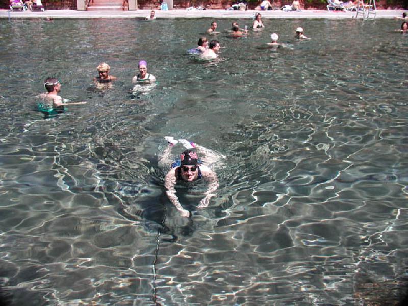 Marla shows that she can still do her famous "smiling breaststroke!" She's also doing butterfly and backstroke, exhibiting superb execution and coordination of all four standard swimming strokes.