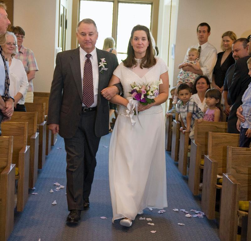 Marla and Mark's Wedding / Here She Comes 5/2008 The anticipated moment has arrived as Leo walks reverently with Marla toward the altar.