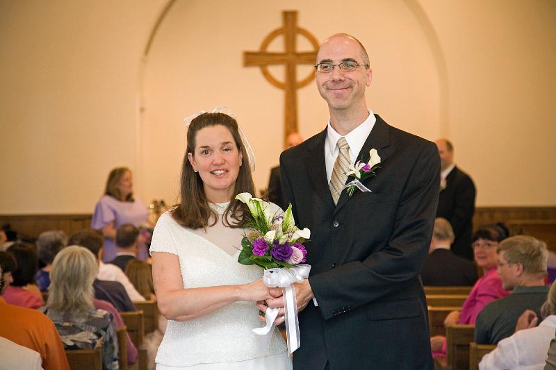 Marla and Mark's Wedding / Down the Aisle in Style 5/2008 The happy couple walking together, hand in hand!