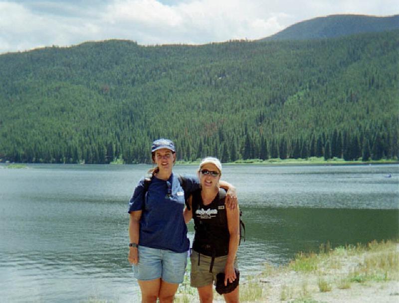 Admiring the scenery near the lake at the National Sports Center for the Disabled women's challenge camp, with a new friend.