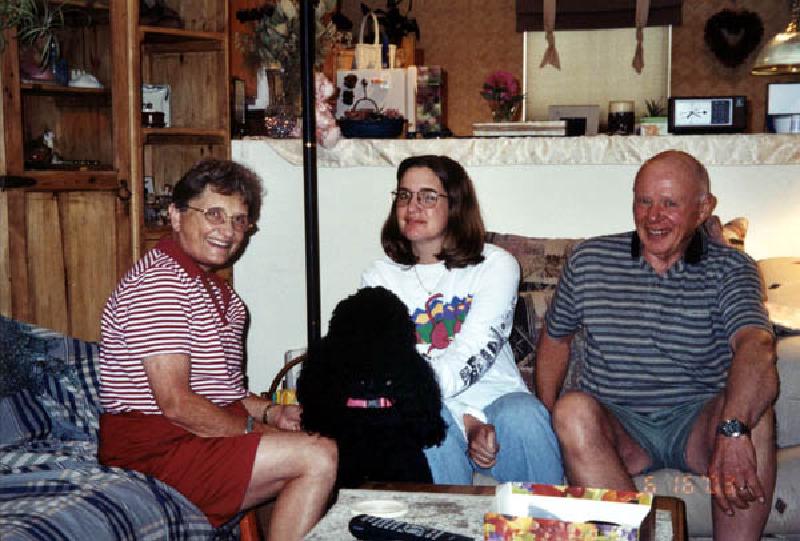 More visits from family! Aunt Anita and Uncle Ray, visiting from Green Valley, Arizona. Marla's having fun playing with their dog, Raven.