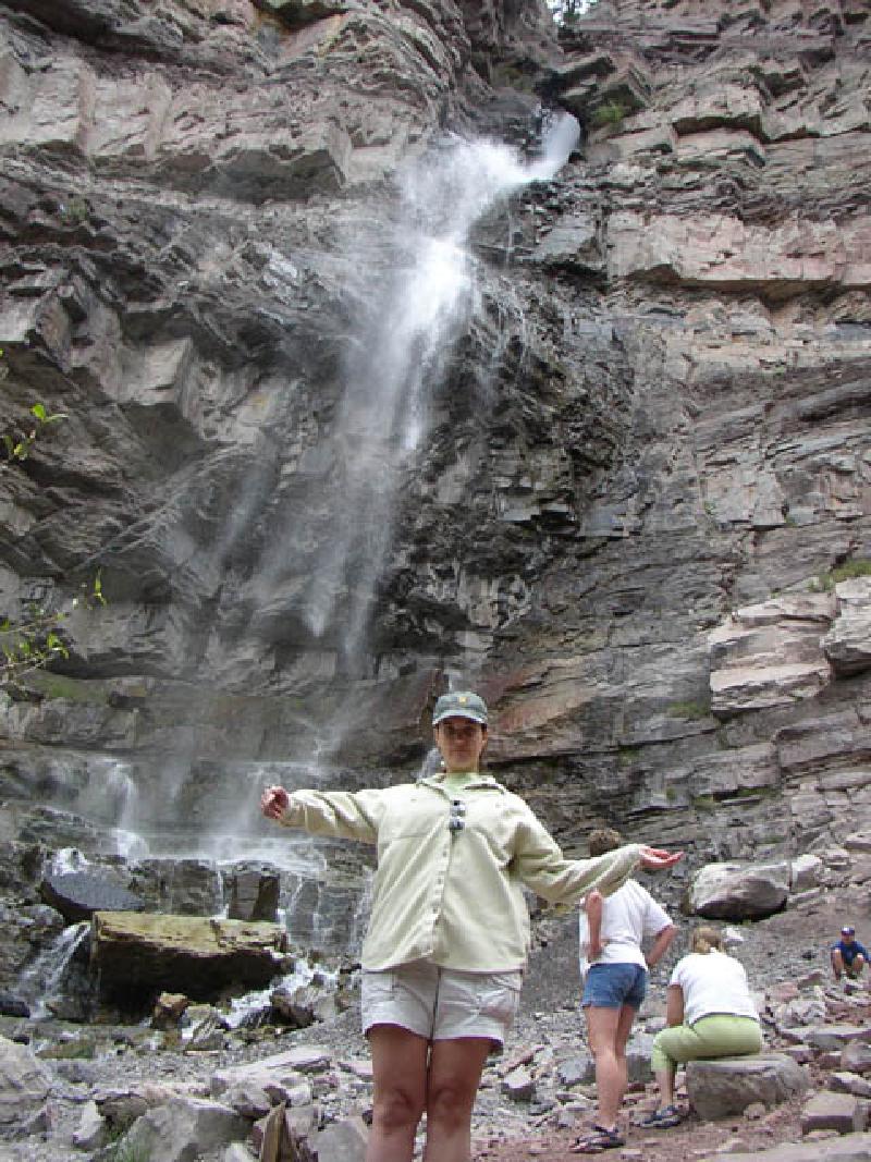 Standing beneath the misty spray of Cascade Falls, during a Fourth of Julyvisit to Ouray, in southwest Colorado, where Marla's parents grew up.