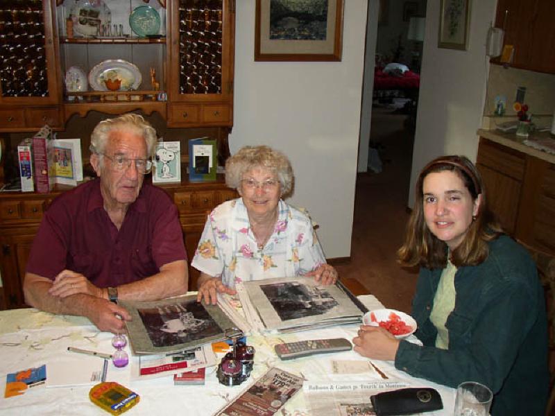 Marla with grandparents Howard and Mary at their home in Montrose,browsing through a memory book that Marla is working on, with pictures fromHoward and Mary's 60th wedding anniversay