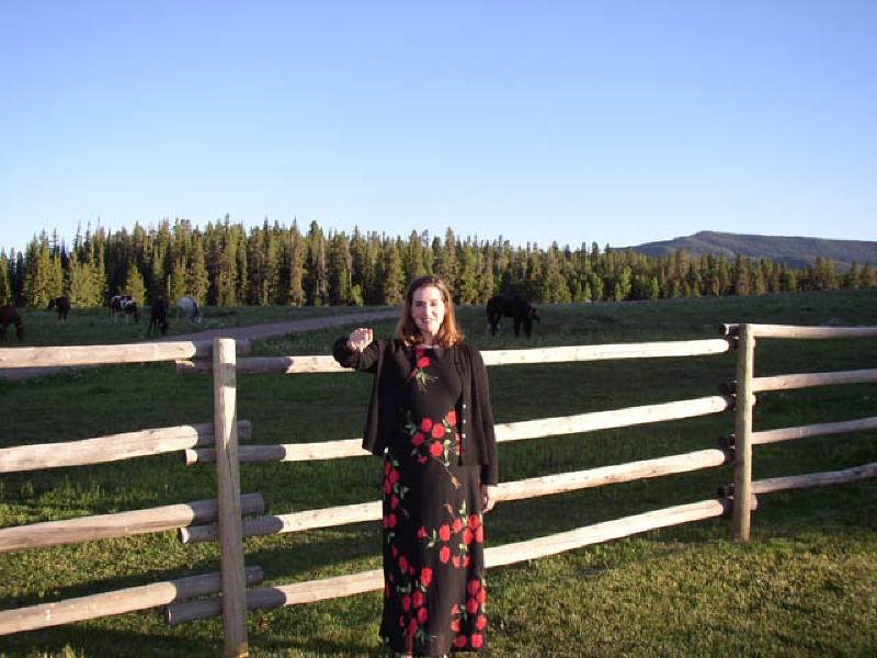Marla shows off the progress of healing and strengthening in her right arm by raising it togive a wave.