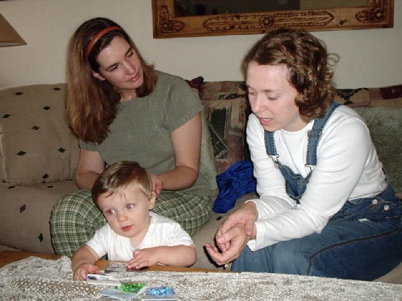 Peggy, Marla's Occupational Therapist at Craig Hospital, stops by for a visit to Marla's housewith son Nolan.