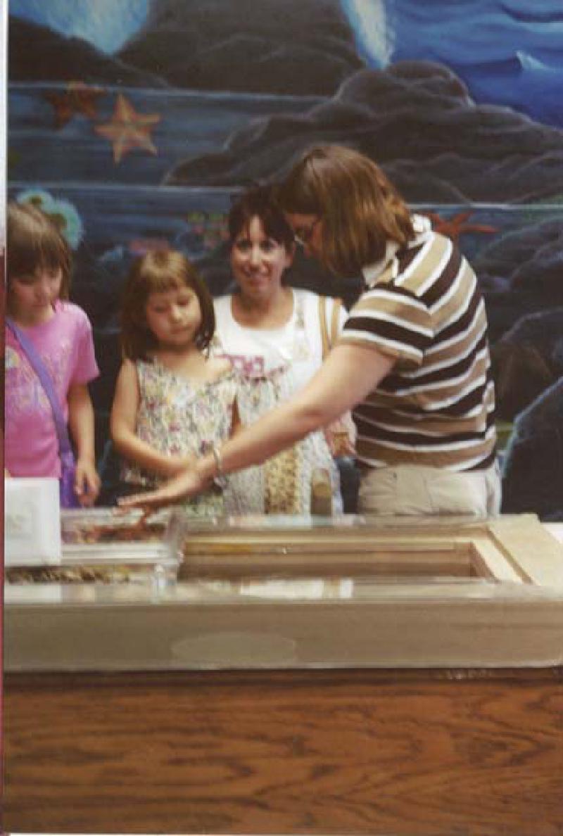 Marla explores some of the hands-on exhibits at the Butterfly Pavilion.