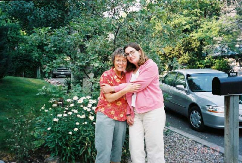 Marla gets a hug from family friend Frannie Gilming during a visit to Glenwood.