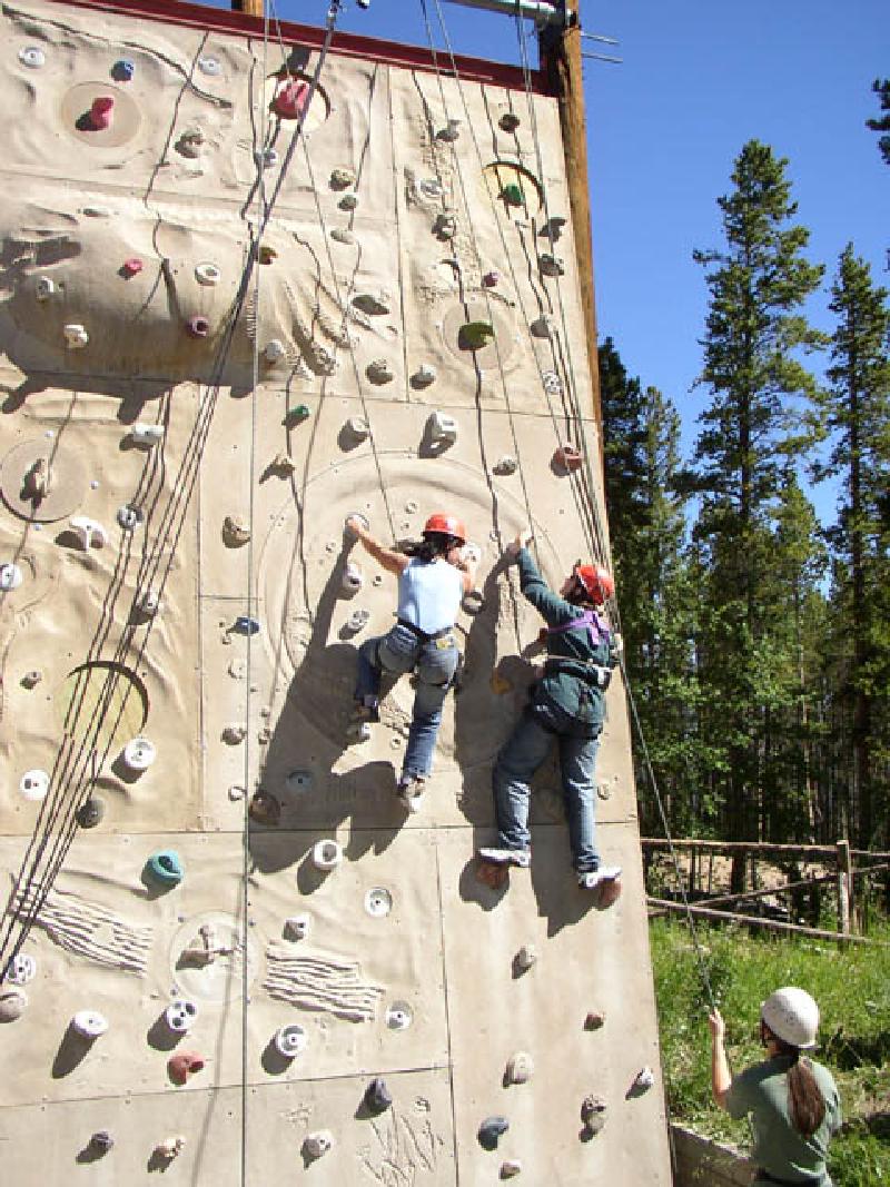 On belay, both Vikki and Marla are making steady progress up the wall.Marla is gaining more confidence as she goes!