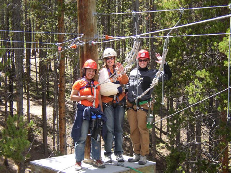 Having completed the hanging vines, Vikki, Marla and Jamie give a wave. Jamie, at right,is the course director for the BOEC.