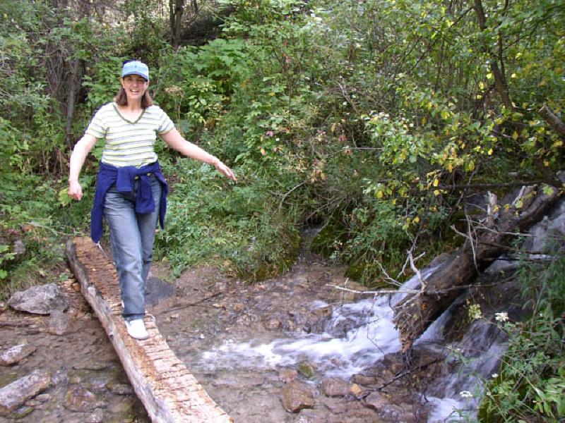 Marla shows off her excellent balance as she crosses a creek while hiking up No-Name Canyonnear Glenwood Springs.
