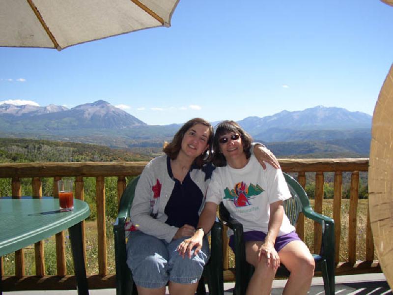 Marla and her cousin Valerie enjoy some cool drinks in the sun, along with some incrediblescenery, during a visit to Aunt Judy and Uncle Joe's cabin above Paonia Reservoir.