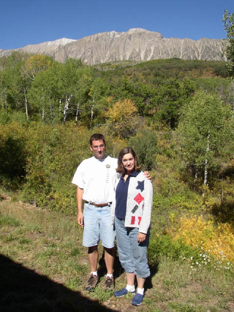 Mark and Marla watch the changing colors of the fall leaves near the baseof Mount Ragged, at their Aunt and Uncle's cabin.