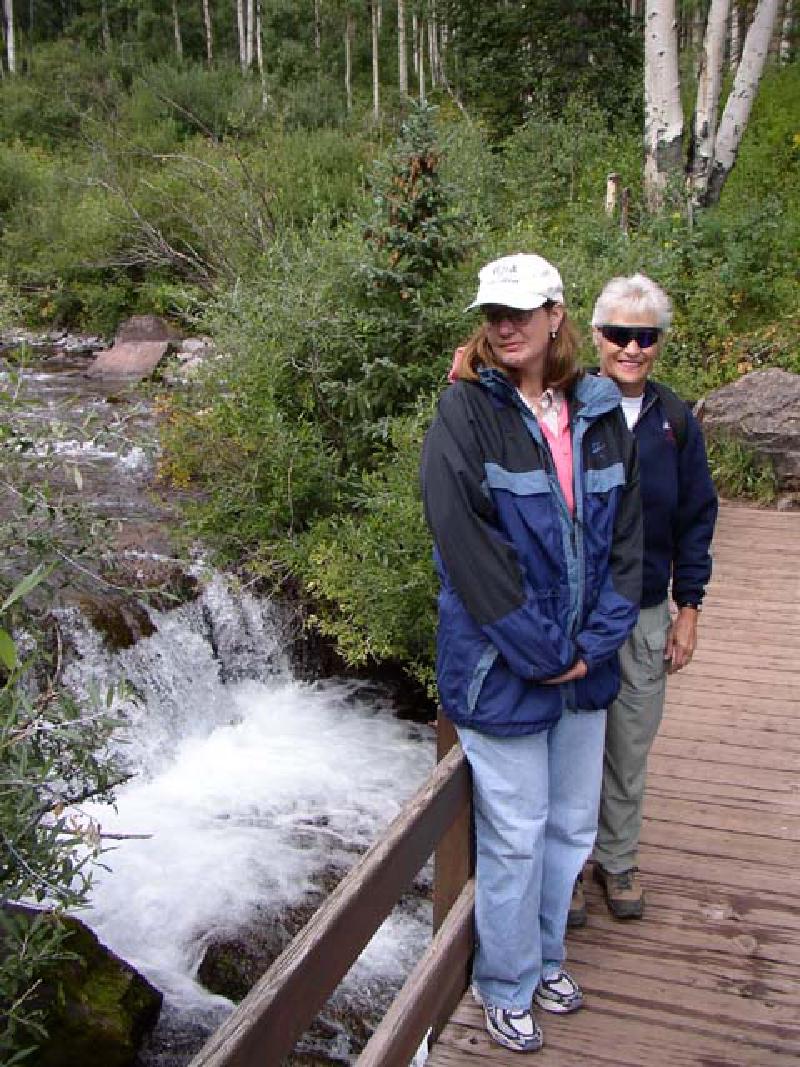 Pausing while crossing over Maroon Creek during the hike.