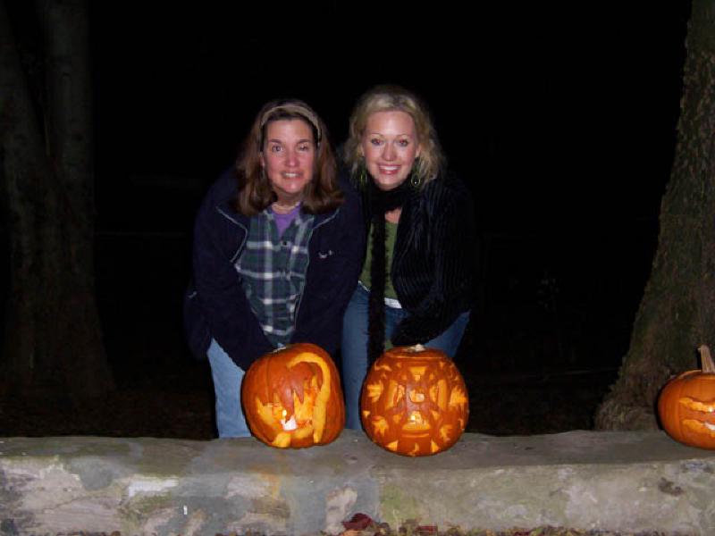 Marla and Nicole posing with the pumpkins they carved! Nicole's (which she did freehand, as did Marla, won the contest).