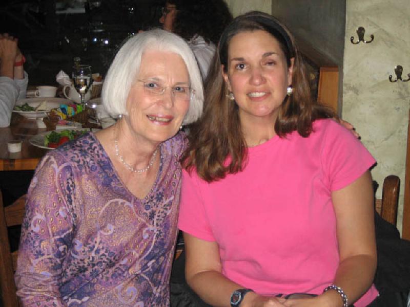 Marla shares a smile with Lynn, who taught her music therapy classes, during an evening dinner out with staff and patients.