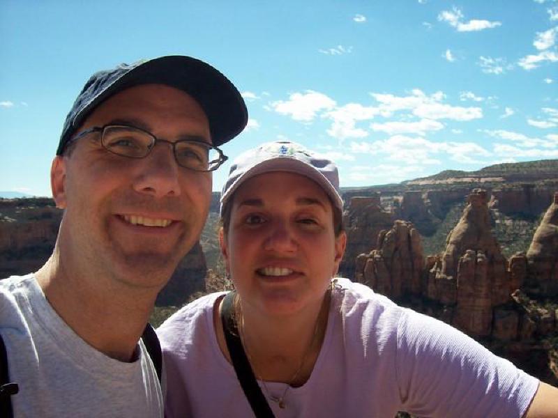 Mark and Marla are all smiles with the scenic canyon behind them.