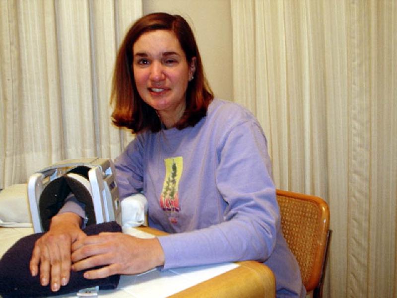 Marla also uses a specially-designed electrical stimulator to help foster healing in the bones and tissues of her right arm. She has given the device a nickname: "Robot."