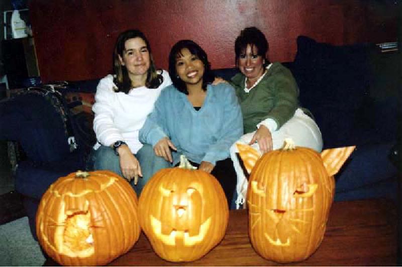 Marla, Missy, and Steffie posing with their pumpkins. Is there any resemblance?