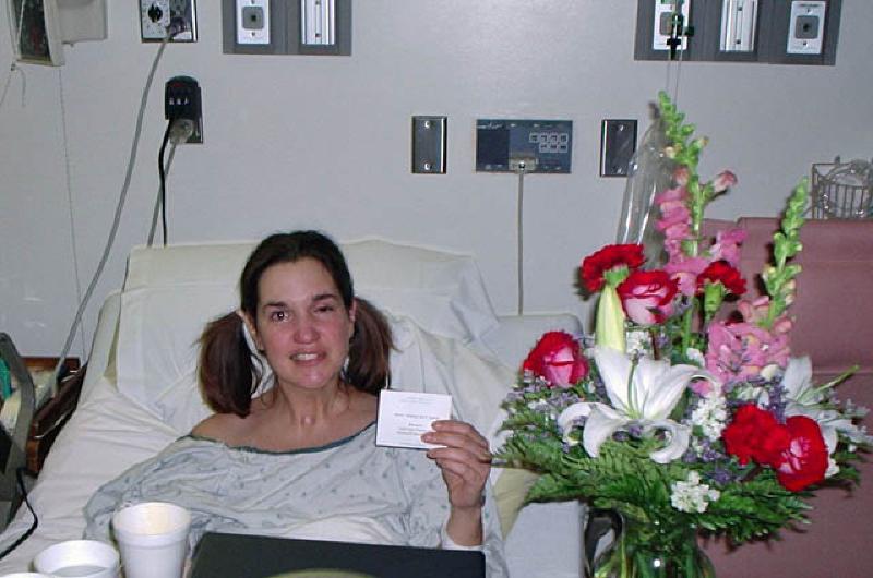 Marla is wowed by the beautiful flowers sent by her friends of Beta Sigma Phi in Glenwood Springs.