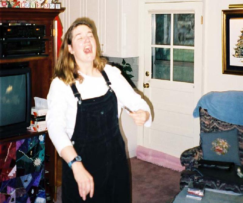 Marla sings out a Christmas carol! When singing familiar songs, she is able to remember and voice the words correctly--exercising a different part of the brain.