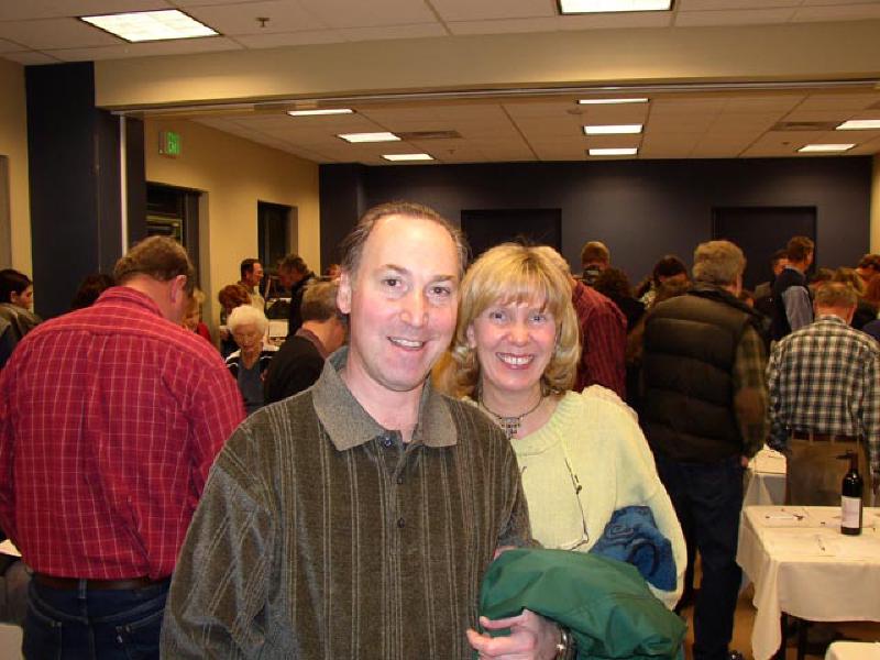 The Adlers looking for some Silent Auction items to take along in their coming travels.